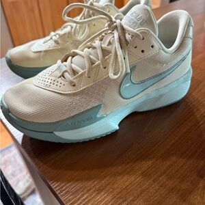 Nike Cream and Blue Athletic Shoes with Breathable Design